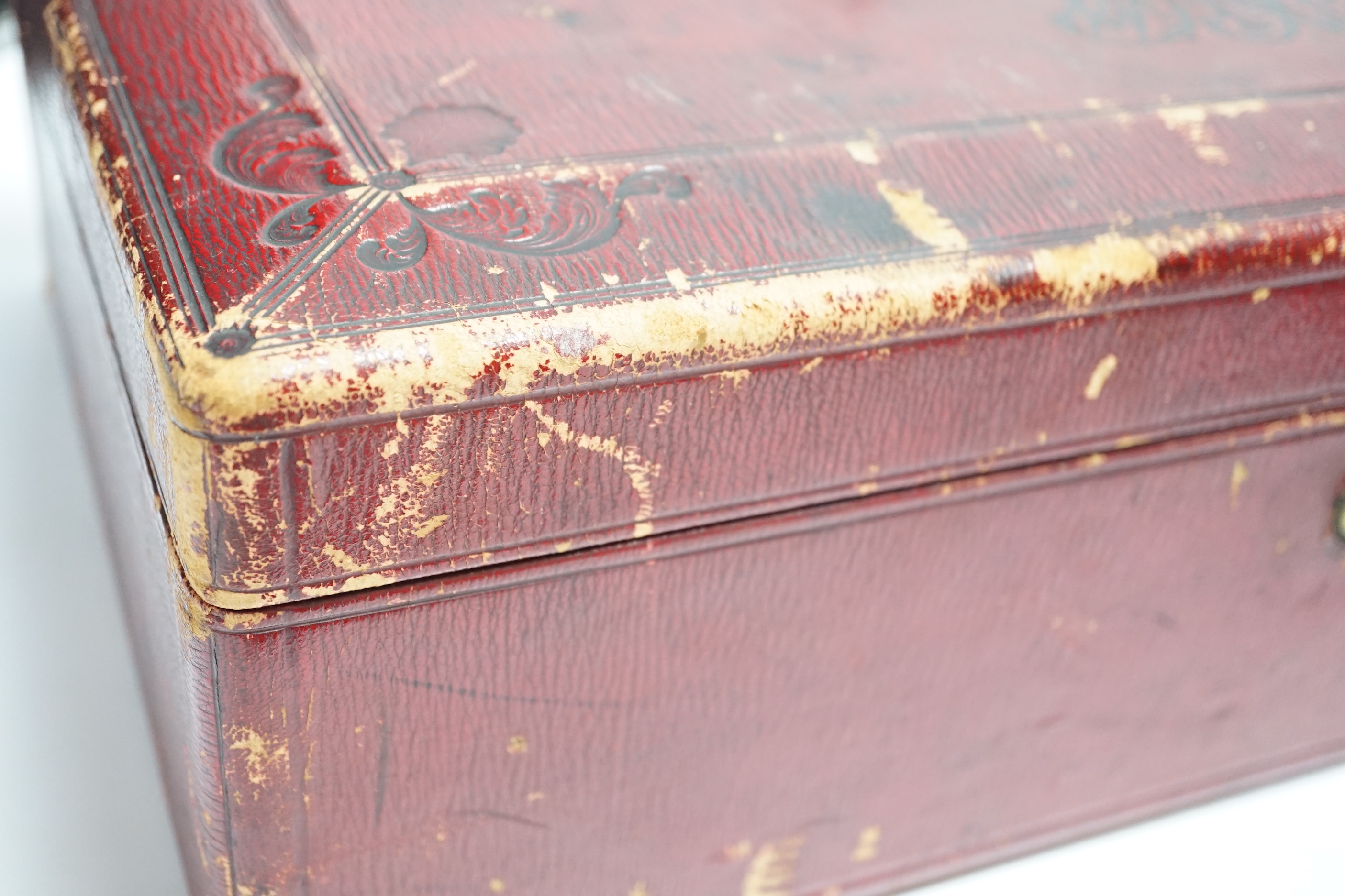 A Victorian red Morocco dispatch box (locked with no key)